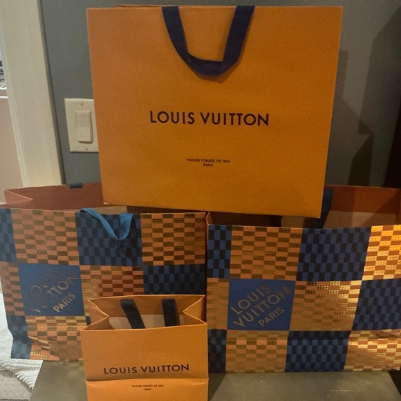 Four Original Louis Vuitton bags. - Picture 1 of 1
